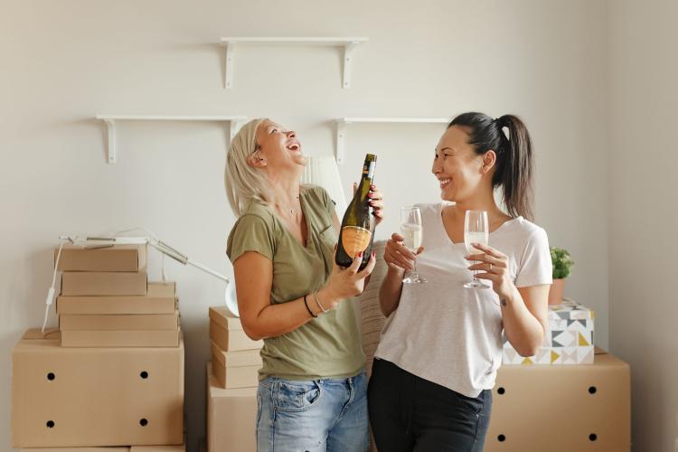 ladies celebrating in their new home